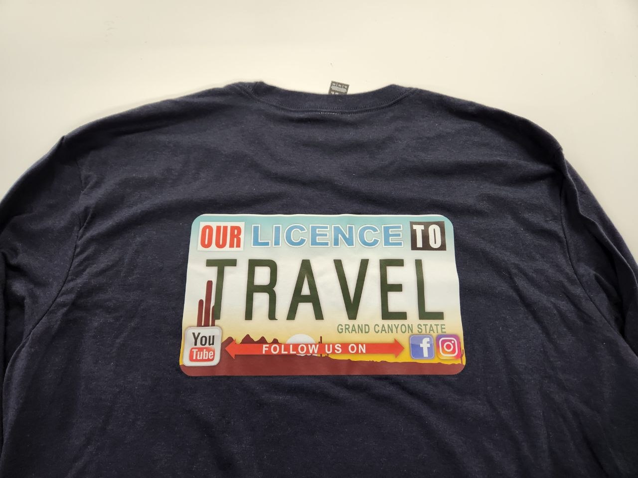 Navy long-sleeve shirt with full-color DTF printed Arizona license plate graphic on back