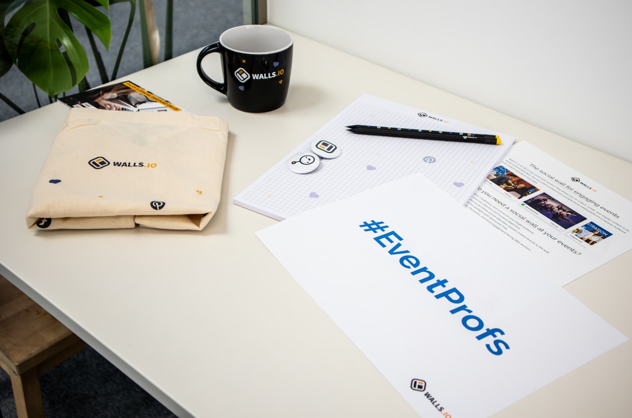 Branded promotional products including custom mug tote bag and printed materials