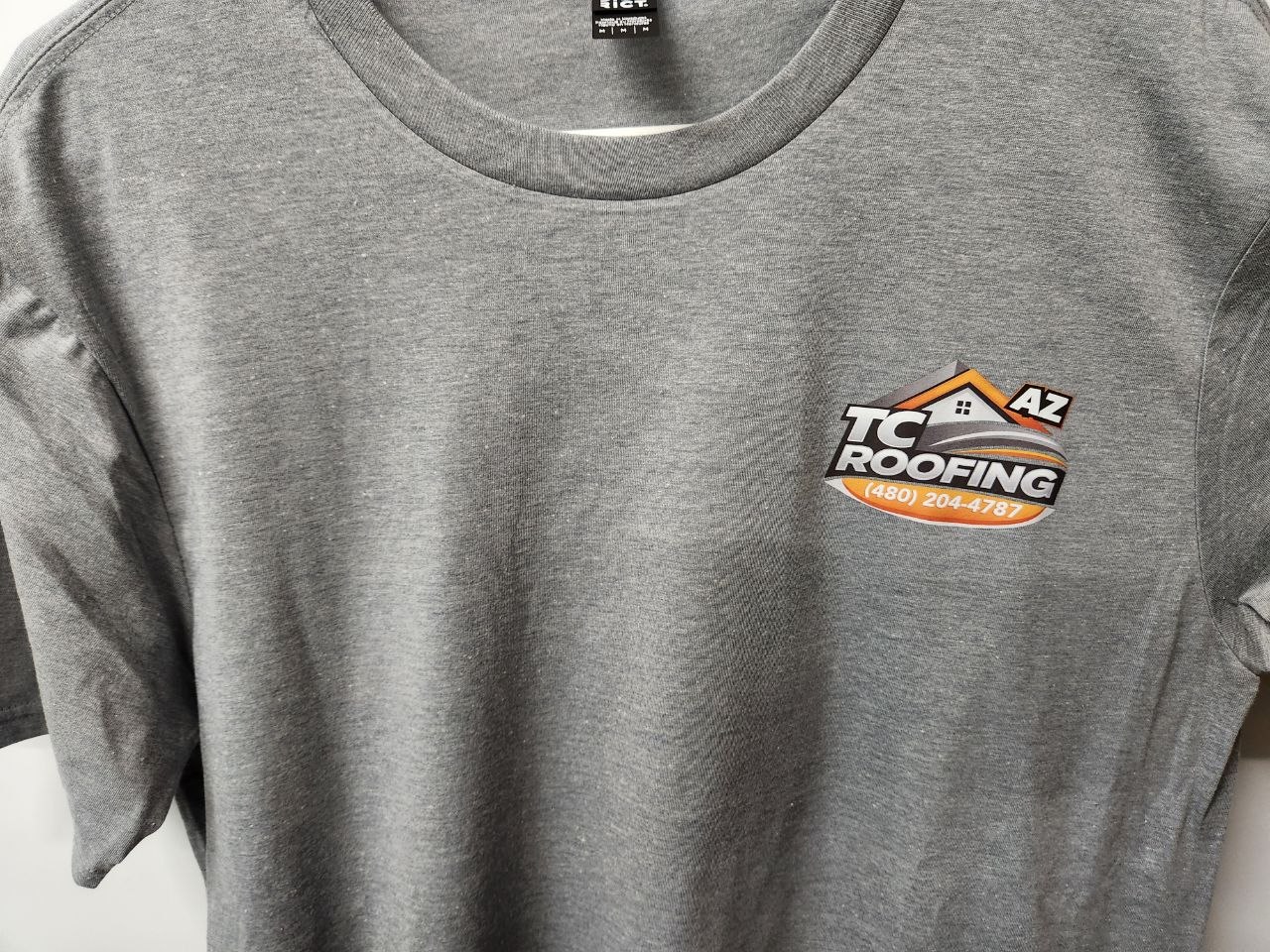 Gray work shirt with custom TC Roofing logo by Out There Promos